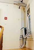 Sitztreppenlift in <br />Parkstellung Sitztreppenlift in Parkstellung